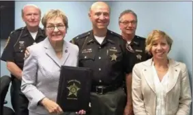  ?? PHOTO COURTESY OF LORAIN COUNTY SHERIFF’S OFFICE ?? Pictured from left: Chief Deputy Dennis Cavanaugh, U.S. Congresswo­man Marcy Kaptur - 9th District, Sheriff Phil R. Stammitti, Captain Jack Hammond and Project Specialist Melissa Myers Fischer. Kaptur and the Lorain County Sheriff’s Office recently held a round table discussion on issues impacting law enforcemen­t.