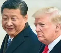  ??  ?? ↑ El presidente de China, Xi Jinping, junto a su homólogo de Estados Unidos, Donald Trump.