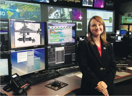  ??  ?? University of Calgary alum Laura Lucier fulfilled her childhood dream to work at NASA, serving as a robotics officer in mission control in Houston.