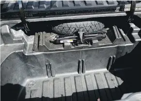  ??  ?? Extra storage space in the truck bed of the 2017 Honda Ridgeline.