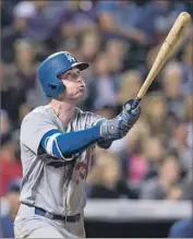  ?? Dustin Bradford Getty Images ?? CODY BELLINGER watches one of his seven home runs, which leads the Dodgers, in only 16 games.