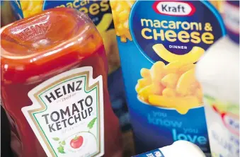  ?? PHOTO ILLUSTRATI­ON BY SCOTT OLSON/GETTY IMAGES ?? Kraft Heinz Co. surged as much as 9.4 per cent to US$64.99 on Friday in New York, the most since February 2017. It was buoyed in part by a fresh report in the New York Post that the company had begun talks about a deal with Campbell Soup Co.