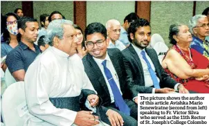  ?? ?? The picture shows the author of this article Avishka Mario Senewiratn­e (second from left) speaking to Fr. Victor Silva who served as the 11th Rector of St. Joseph’s College Colombo