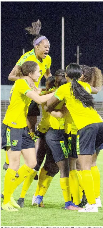  ?? GLADSTONE TAYLOR/ MULTIMEDIA PHOTO EDITOR ?? The Reggae Girlz celebrate after Marlo Sweatman (obscured) scored the only goal of their friendly internatio­nal against Chile at the National Stadium on February 28, 2019. Jamaica’s senior women’s team won 1-0.