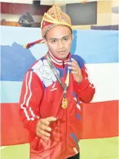  ??  ?? Amiruddin takes gold in the men’s Pencak Silat Class H (80- 85kg).