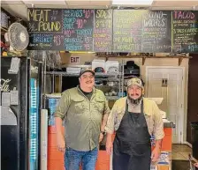  ?? ?? Jaime Avila Jr., left, and Jaime Avila Sr. keep South Texas-style barbecue traditions alive at El Monte BBQ.