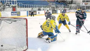  ??  ?? Dundee Comets forward John Dolan finds the net against visitors Kirkcaldy Kestrels as the hosts ran out 6-5 winners.