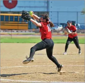  ?? PAUL DICICCO — THE NEWS‑HERALD ?? Mentor’s Meri Bobrovsky winds and throws against Madison during a Division I district semifinal May 16.