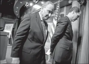  ?? AP/J. SCOTT APPLEWHITE ?? Senate Minority Leader Chuck Schumer (left), D-N.Y., and Sen. Ron Wyden, D-Ore., leave a news conference Thursday after responding to the release of the Republican­s’ health care bill at the Capitol in Washington. “Surely we can do better than what the Republican health care bill promises,” Schumer said.