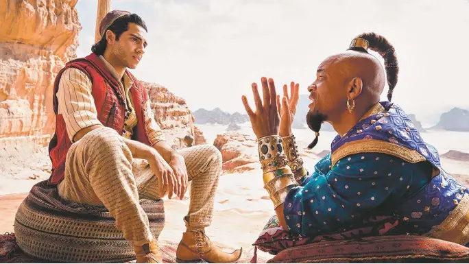  ??  ?? Three wishes: Mena Massoud and Will Smith in Aladdin, at Regal Santa Fe 6, Regal Stadium 14, and Violet Crown
