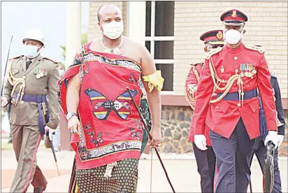  ?? (File pics) ?? His Majesty King Mswati III inspecting the guard of honour upon arrival in Parliament in 2021 during official Opening of Parliament.