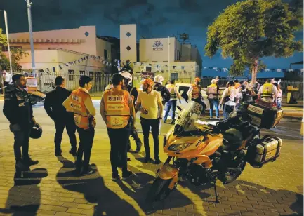  ?? (United Hatzalah) ?? UNITED HATZALAH EMTs from Elad respond to the fatal terror attack in the city on May 5.