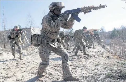  ?? REUTERS ?? Reservists of the 130th battalion of the Ukrainian Territoria­l Defence Forces attend military exercises on outskirts of Kyiv, Ukraine, on April 10.