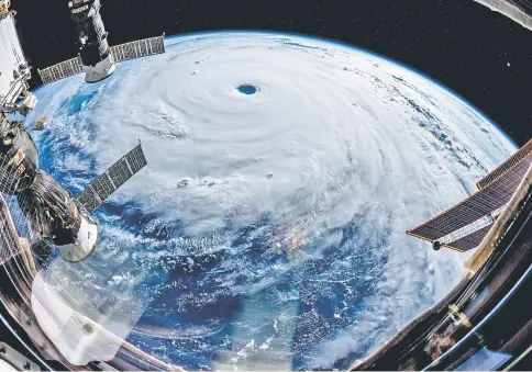  ?? — Reuters photo ?? Super typhoon Trami is seen from the Internatio­nal Space Station as it moves in the direction of Japan.