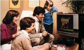  ?? ?? A family play Space Invaders on the Atari in the 1970s. Photograph: INTERFOTO / Alamy Stock Photo/Alamy