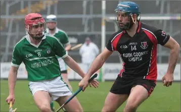  ??  ?? Garrett Sinnott of Oulart-The Ballagh and Barry Carton (Cloughbawn) in action last May.