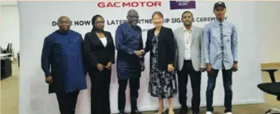  ?? ?? R-L: Chairman, CIG Motors, Diana Chen and executive director of Lotus Bank, Alhassan Abdulkarim at the Auto Finance Scheme signing ceremony in Lagos recently.