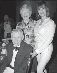  ??  ?? John and honoree Pat Lile (standing, left) with Arkansas Women’s Hall of Fame Chairman Holly Fish