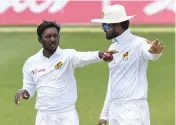  ?? — AFP ?? Dinesh Chandimal ( right) will miss Sri Lanka’s third Test against West Indies after getting a one match ban.