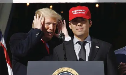  ?? Photograph: Patrick Semansky/AP ?? Donald Trump with Washington Nationals catcher Kurt Suzuki during a ceremony at the White House to celebrate the team’s championsh­ip.