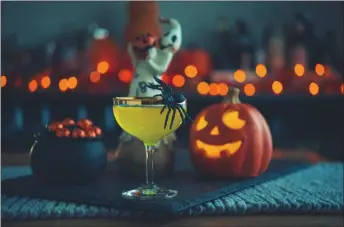  ??  ?? Get everyone you know in on the fun by throwing a decorating party. Your creative friends might even enjoy a creepy-themed drink.