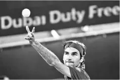  ?? - AFP photo ?? Roger Federer is just three wins away from his 100th career title after seeing off Fernando Verdasco to move into the last eight of the Dubai Championsh­ips.