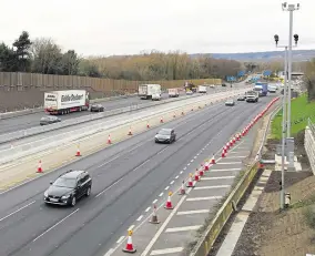  ??  ?? Smart motorway upgrades on a stretch of the M20 near Aylesford; drivers making essential journeys can now use a fourth lane