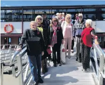  ?? PHOTO: SUPPLIED ?? Living history . . . Disembarki­ng from TSS Earnslaw are some of the 30 guests from the Queenstown and Arrowtown RSAs who were invited for a trip across Lake Wakatipu. A remembranc­e ceremony was held during the cruise and the steamship’s horn was sounded 11 times.