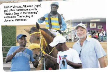  ?? ?? Trainer Vincent Atkinson (right) and other connection­s with Rhythm Buzz in the winners’ enclosure. The jockey is Javaniel Patterson.