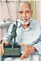  ?? ?? Above: J. Pitchaiah poses with the Arjuna Award that he won in 1970.
Below: Pitchaiah during his 104th birthday recently, on December 21.