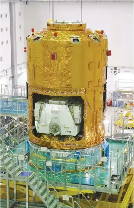  ??  ?? ANEGASHIMA SPACE CENTER, Japan: This July 6, 2016 picture shows the HTV6, an unmanned cargo spacecraft, “Kounotori”, or “stork” in Japanese, being assembled at the Tanegashim­a Space Center in Tanegashim­a island, Kagoshima prefecture. —AFP