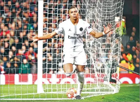  ?? FRANCK FIFE/AFP ?? Paris Saint-Germain’s French striker Kylian Mbappe celebrates scoring his team’s second goal in the first leg of the Uefa Champions League round of 16 match against Manchester United at Old Trafford in Manchester on Tuesday.