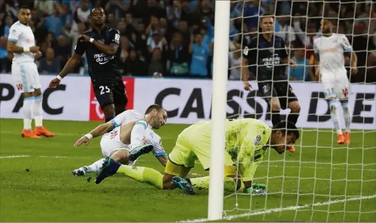  ?? (Photos AFP) ?? En répondant à l’ouverture de score de Balotelli, Germain a remis l’OM en marche. Avant que Payet ne fasse basculer le match en faveur des Olympiens.