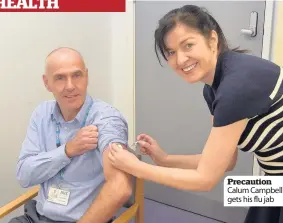  ??  ?? Precaution Calum Campbell gets his flu jab