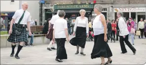  ?? Photograph­s: Abrightsid­e Photograph­y. ?? Below: Country dancers entertaine­d passengers on Cameron Square.