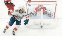  ?? BRUCE BENNETT/GETTY ?? The Panthers’ Matthew Tkachuk scores the game-winner in overtime of Game 2 of the Eastern Conference finals Saturday.