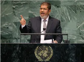  ?? AP PHOTO ?? Egyptian President Mohammed Morsi addresses the 67th session of the United Nations General Assembly on Wednesday.