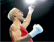  ?? PHOTOS: GETTY IMAGES ?? David Nyika celebrates winning his 91kg semifinal against England’s Cheavon Clarke in the Commonweal­th Games yesterday.