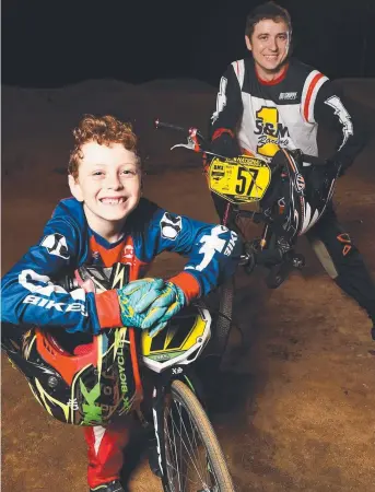  ?? EYES ON PRIZE: Townsville BMX Club riders Hunter Boschen, 9, and Craig Cullen are heading to the world titles in South Carolina, USA. Picture: ZAK SIMMONDS ??