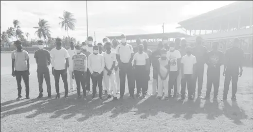  ?? ?? Reon King poses with the young fast bowlers after the clinic.