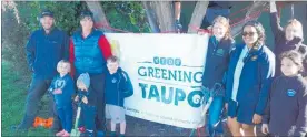  ?? Photo / File ?? Thea De Petris (centre right) and students from Kids Greening Taupo¯ .