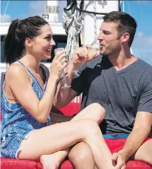 ?? PAUL HEBERT/ABC ?? Bacheloret­te Becca Kufrin, left, and her new fiancé Garrett Yrigoyen found themselves entwined in controvers­y as Yrigoyen’s Instagram activity came under a magnifying glass.