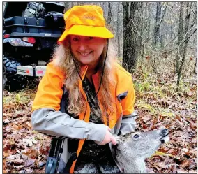  ?? (Arkansas Democrat-Gazette/Bryan Hendricks) ?? Lisa Saldivar of Houston, Texas, shot her first deer on Tuesday in a journey that started with her scarcely being able to hit paper at 50 yards to hitting a target at 1,000 yards.