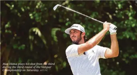  ?? AFP PIC ?? Max Homa plays his shot from the third during the third round of the Valspar Championsh­ip on Saturday.