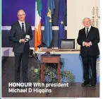  ??  ?? HONOUR
With president Michael D Higgins