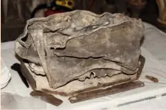  ??  ?? Above: The relics were kept in a casket which seems to have been made from part of a Roman lead coffin