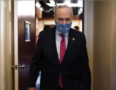  ?? AP FILE ?? Senate Majority Leader Chuck Schumer leaves a news conference last month in Washington.