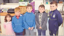  ?? John Ahern) (Pic: ?? Lily O’Farrell, seen here with, l-r: Jack Browne, Noah Browne, Bobby O’Farrell and Billy O’Farrell, at the Castletown­roche National School Open Night.