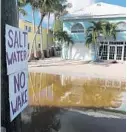  ?? JOE RAEDLE/GETTY ?? This Key Largo neighborho­od endured flooding for close to three months after one of the worst king-tide seasons in memory.