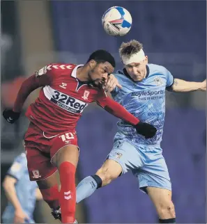  ?? PICTURE: MIKE EGERTON/PA ?? BORO BATTLE: Middlesbro­ugh’s Chuba Akpom and Coventry City’s Kyle McFadzean battle for the ball during their Championsh­ip match last night.